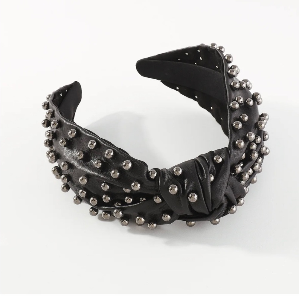 Black vegan leather headband.